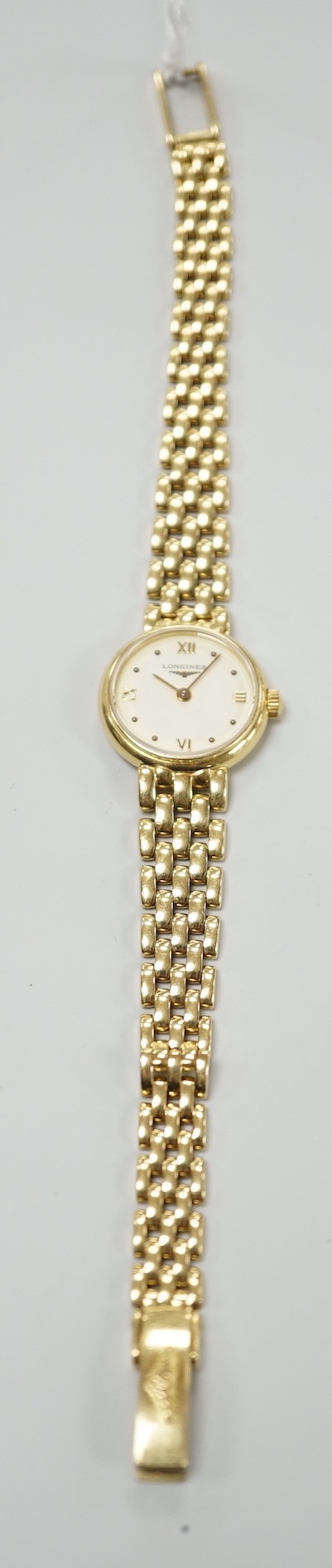 A lady's 2001 18ct gold Longines quartz wrist watch, on an 18ct gold Longines bracelet, overall length 18cm, gross weight 29.2 grams, with box and papers.